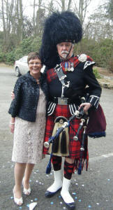 A guest at the wedding Laura and Paul with James A Nicholl Scottish Piper at their wedding at Strathblaine Country House Hotel