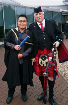 Jim with Xu Wang at Heriot Watt Graduations 2014.